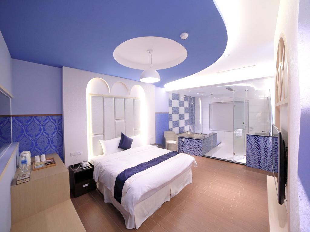 Garden Spring Hotel Цзяосі Номер фото