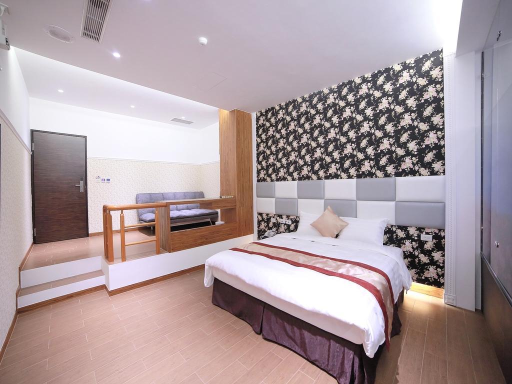 Garden Spring Hotel Цзяосі Номер фото