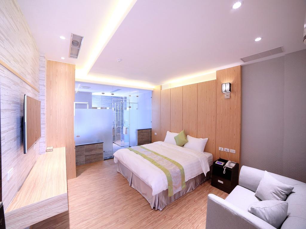 Garden Spring Hotel Цзяосі Номер фото