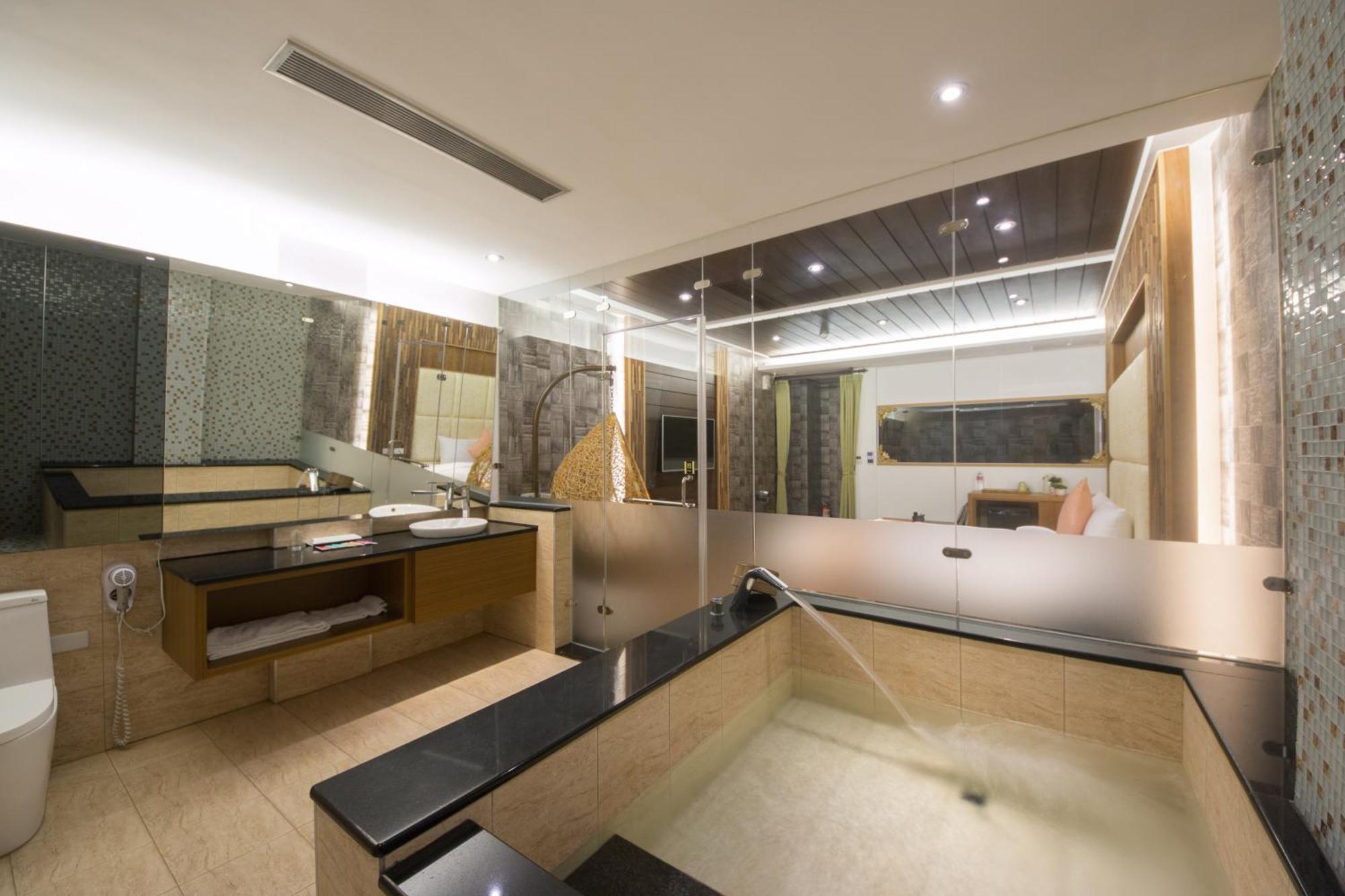 Garden Spring Hotel Цзяосі Номер фото