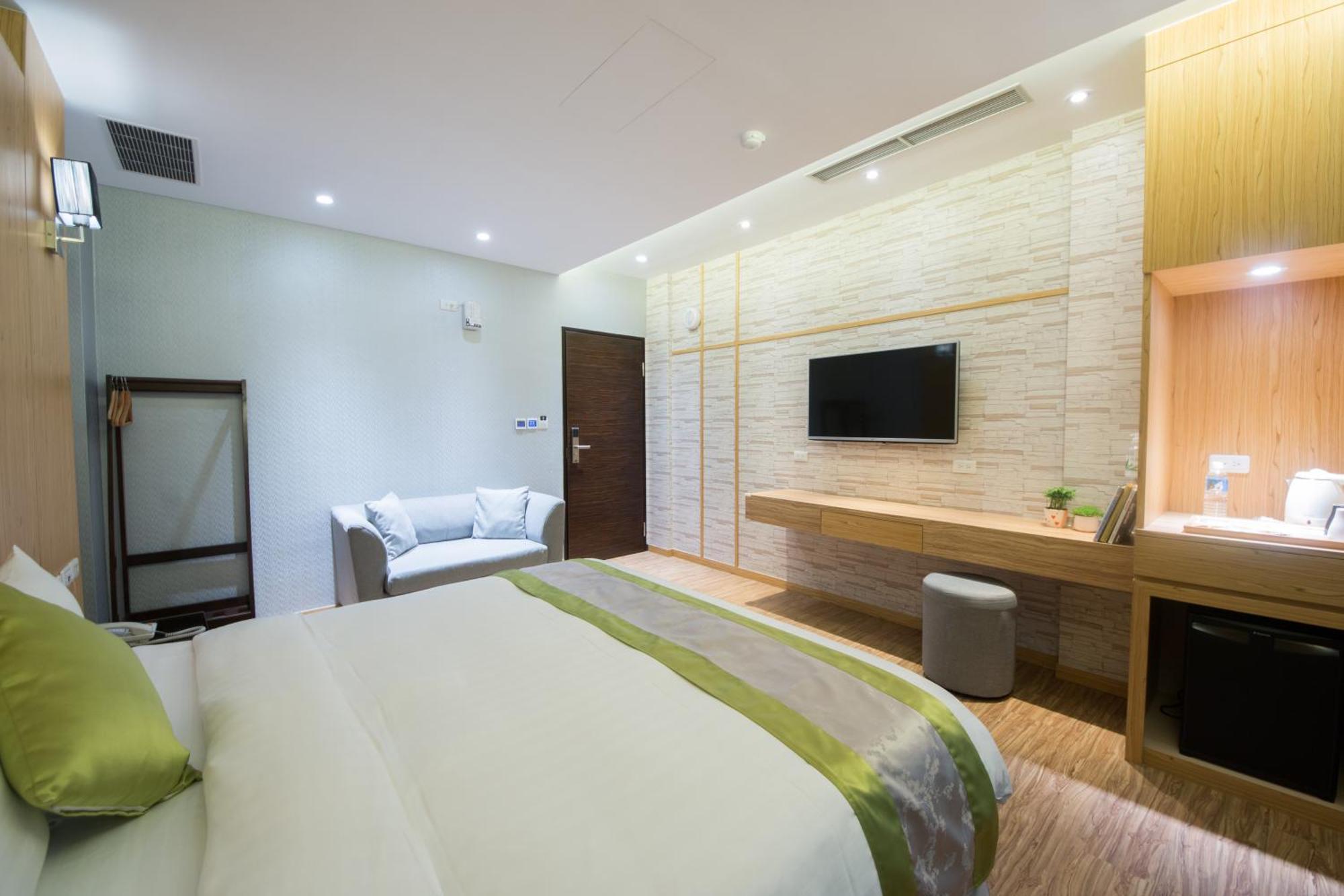 Garden Spring Hotel Цзяосі Номер фото