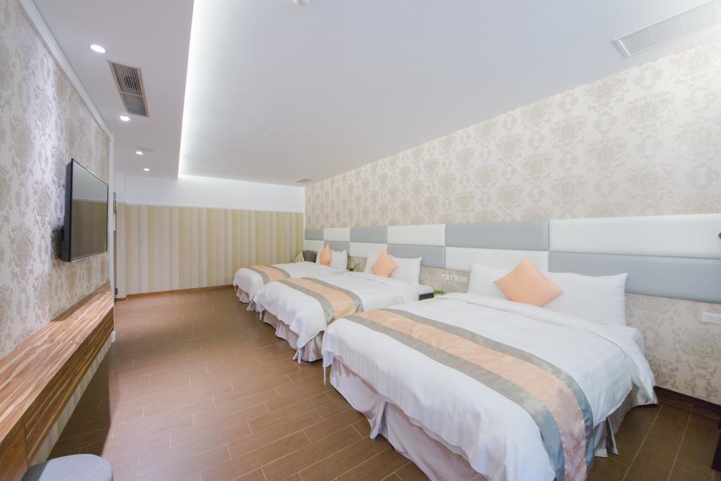 Garden Spring Hotel Цзяосі Номер фото