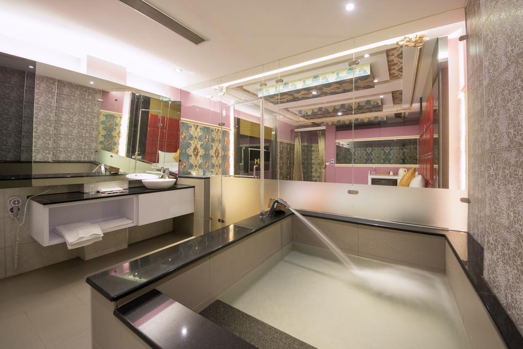 Garden Spring Hotel Цзяосі Номер фото