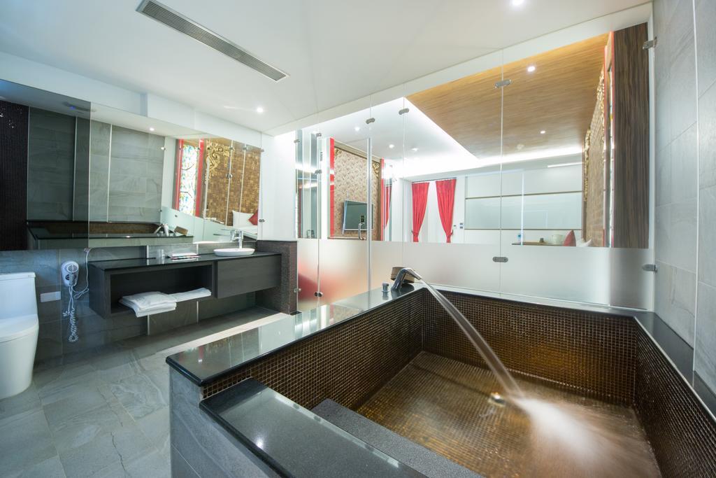 Garden Spring Hotel Цзяосі Номер фото