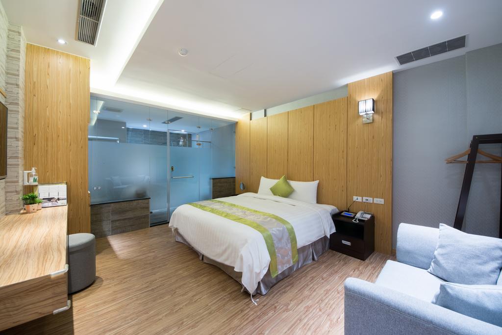 Garden Spring Hotel Цзяосі Номер фото